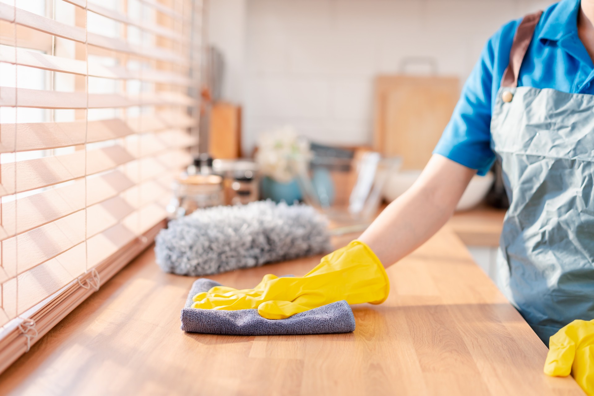 Housework or house keeping service female cleaning dust in house, cleaning agency small business. professional equipment cleaning old home.